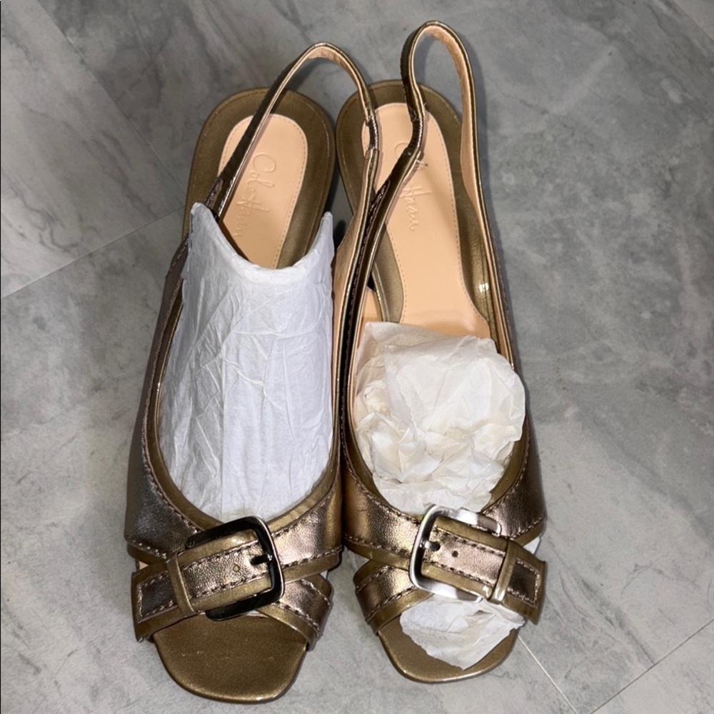 Cole Haan open to sling back shoes
Sandals heels Gold patent/gold leather NWOT